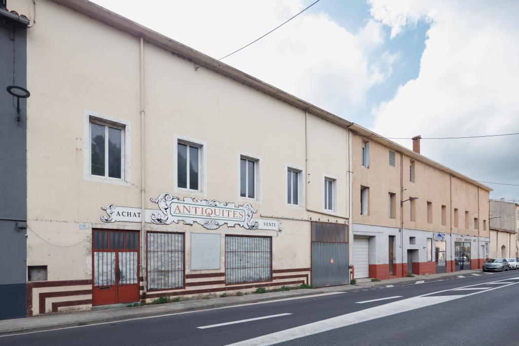 usine textile (tissage) Rouaud, puis Vinas, puis Teisserenc-Vissecq, actuellement magasin de commerce et logement