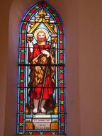 ensemble de 4 verrières hagiographiques (baie 3 à 6) : Saint Jean-Baptiste, Saint Dominique, Saint Antoine le Grand, Sainte Justine de Padoue et d'une verrière décorative (baie 7)