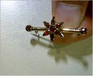 Broche tubulaire à décor d'étoile