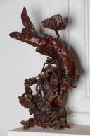 Paire de statuettes orientales : Vieux sage assis et poisson