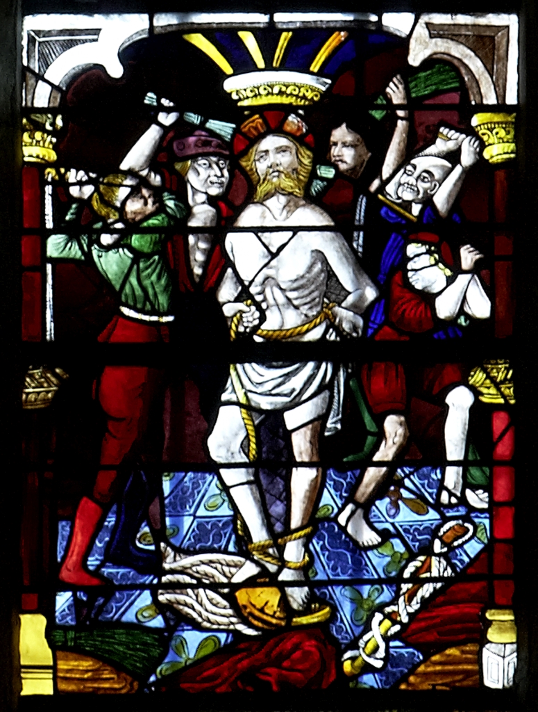 verrière : l'Entrée de Jésus à Jérusalem, la Cène, le Lavement des pieds, l'Agonie au Jardin des oliviers, le Baiser de Judas, Jésus devant Hérode, la Flagellation, le Couronnement d'épines, le Portement de croix, la Crucifixion, la Mise au tombeau, la Résurrection, anges, quatre prophètes, père éternel