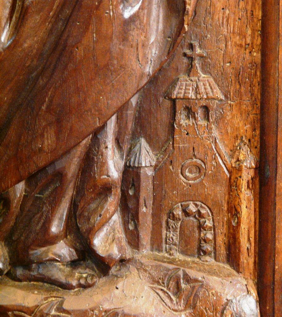 ensemble du retable du maître-autel : retable architecturé, autel tombeau, statue (grandeur nature) : Saint Michel terrassant le dragon et trois tableaux : La Crucifixion, Saint Michel terrassant le dragon et Saint Louis en prière