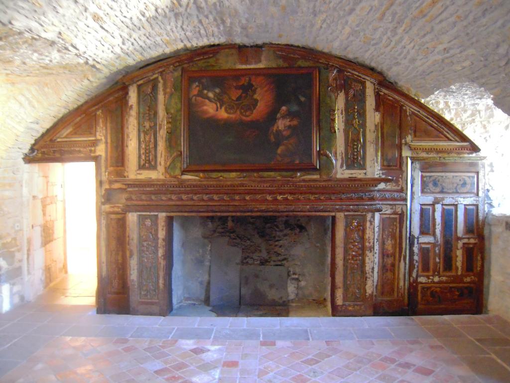 cheminée, avec tableau d'Elie sur son chariot de feu