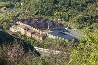 usine textile (usine de drap) Rouaud et Vinas, puis Teisserenc-Visseq, puis Teisserenc-Harlachol, puis usine de bonneterie (usine de bas) Pluto SA, puis DimTex, puis Les Moulinages du Lodévois, actuellement centrale hydroelectrique